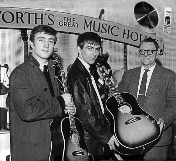 John Lennon and George Harrison receive Gibson J-160E guitars, Rushworth's Music House, Liverpool, September 1962