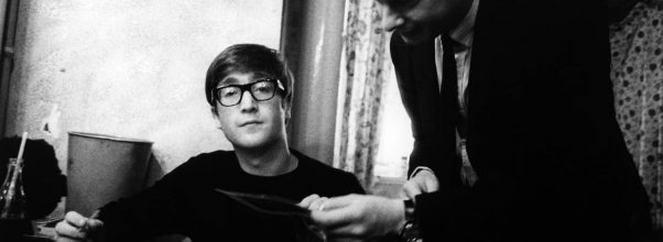 John Lennon and Brian Epstein, 1963