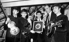 The Beatles receive their first silver disc. With George Martin, 5 April 1963