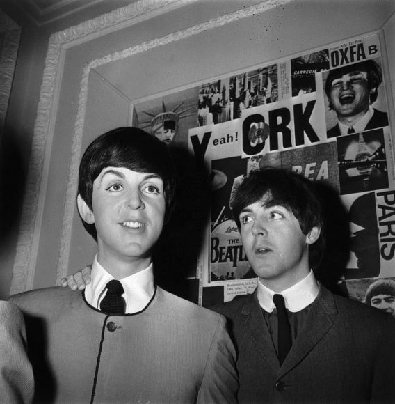 Paul McCartney with his Madame Tussaud's waxwork figure, 29 April 1964