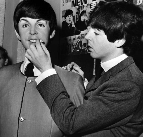 Paul McCartney with his Madame Tussaud's waxwork figure, 29 April 1964