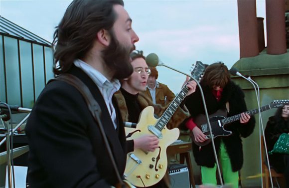 Paul McCartney, John Lennon, Kevin Harrington, George Harrison, Yoko Ono – Apple rooftop, 30 January 1969