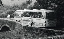 The Beatles' Magical Mystery Tour coach gets stuck on a br