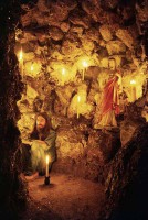 George-Harrison-in-a-Cave-Shrine-Friar-Park-1970.jpg